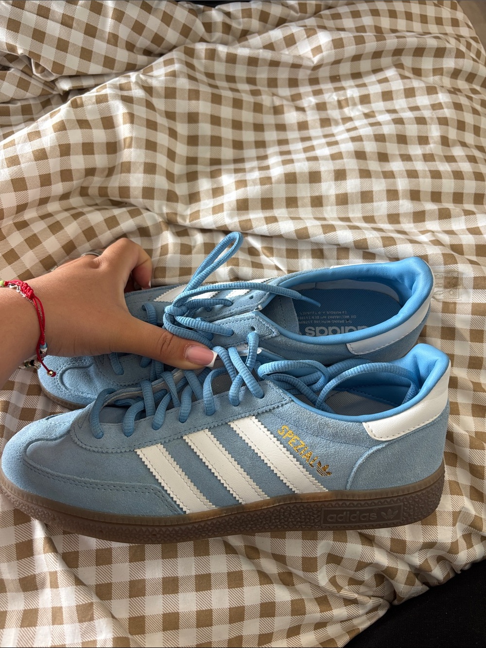 adidas light blue suede Spezial sneakers with white stripes